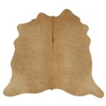 Un Tapis peau de vache cuir de vachette beige sur un fond blanc.
