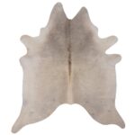 Un tapis peau de vache poil ras | 180x160 cm sur un fond blanc.