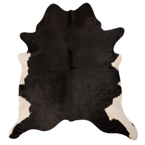 Un tapis peau de vache noir brillant et blanc | 210x180 cm sur un fond blanc.