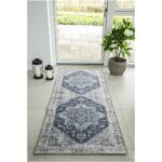 A Tapis à motif géométrique | 200x80 cm avec un motif géométrique mesurant 200x80 cm.