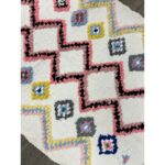 Tapis berbère marocain vintage laine fait main - 108x67 cm.