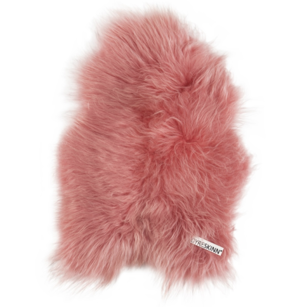 Un tapis en peau de mouton rose peau de mouton rose orange | 100×65 cm sur fond blanc.