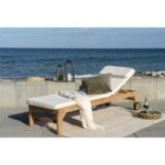 Un tapis de salon en bois couleur sable avec un coussin blanc couleur sable | 200x140 cm.