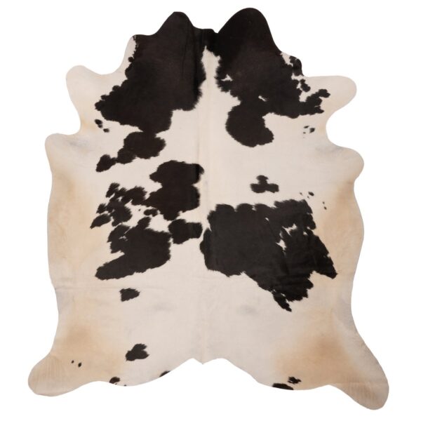 A Tapis peau de vache couleur noir et blanc | 210×180 cm sur fond blanc, mesurant 210×180 cm.