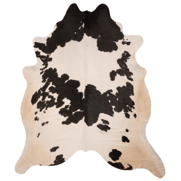 Un tapis peau de vache haut de gamme blanc et noir | 210x180 cm sur un fond blanc.