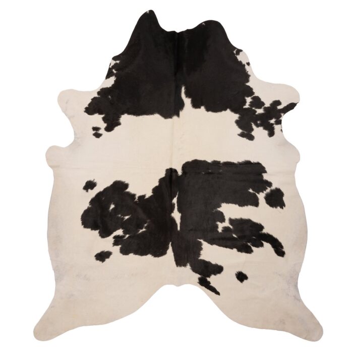 Grand tapis peau de vache noir et blanc | 210x180 cm sur un fond blanc.