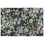 Un set de table floral vert et blanc.