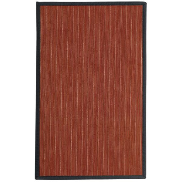 Un tapis rouge avec une bordure noire.