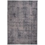 Un tapis gris et noir au design abstrait.