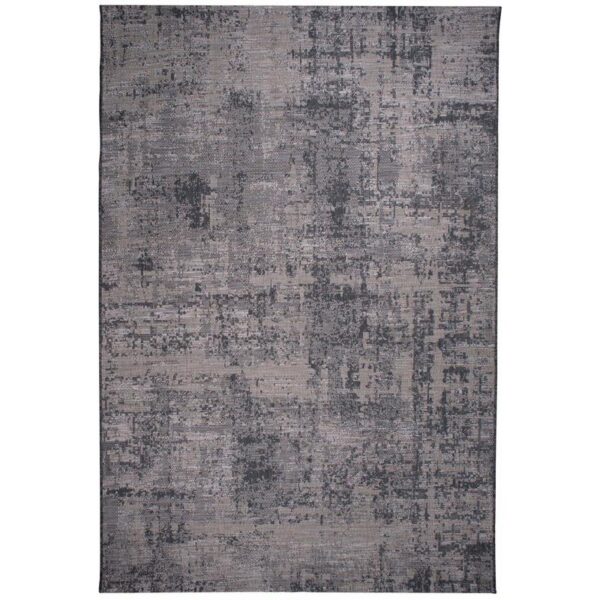 Un tapis gris et noir au design abstrait.