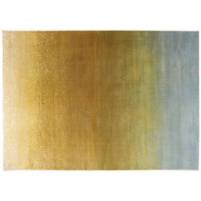 Un tapis de couleur jaune, bleu et vert.