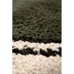 Un gros plan d'un tapis vert.