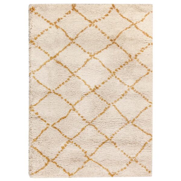Un tapis beige et jaune au design géométrique.