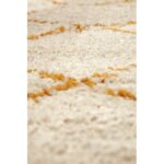 Description modifiée : Une image en gros plan d’un tapis blanc.