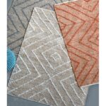 Trois tapis aux motifs géométriques - dessus.
