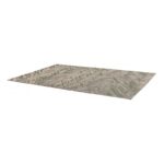 Un tapis avec un motif vert et beige sur fond blanc.