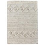 Un tapis beige avec un motif en losange.