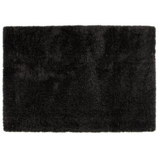 Un tapis shaggy noir sur fond blanc.