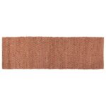 Un tapis de passage rouge sur fond blanc.