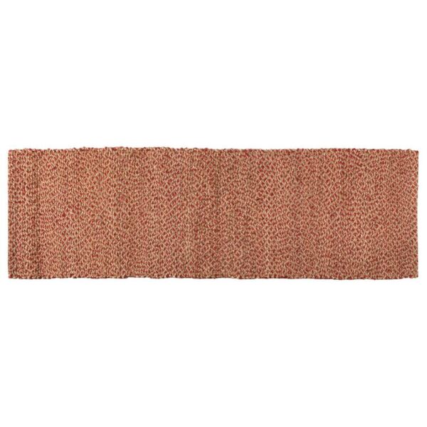 Un tapis de passage rouge sur fond blanc.