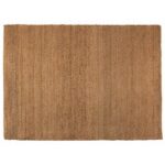 Un tapis en jute sur fond blanc.