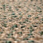 Un gros plan d'un tapis vert.