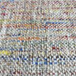 Un gros plan d'un tissu.