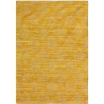 Un tapis jaune avec un motif en losange.