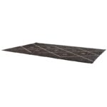 Un tapis noir avec un motif en losange.