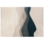 Un tapis gris et blanc avec des vagues.