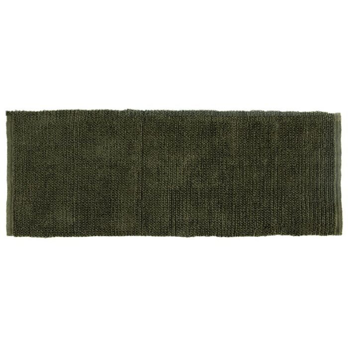 Un tapis de bain vert sur fond blanc.