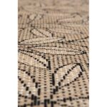 Tapis design géométrique noir et beige.