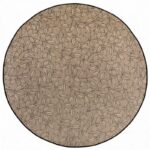 Tapis rond beige à motifs feuilles pour décoration intérieure.