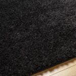 Tapis noir texturé en gros plan