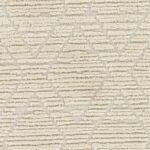 Texture de tapis beige à poils courts.