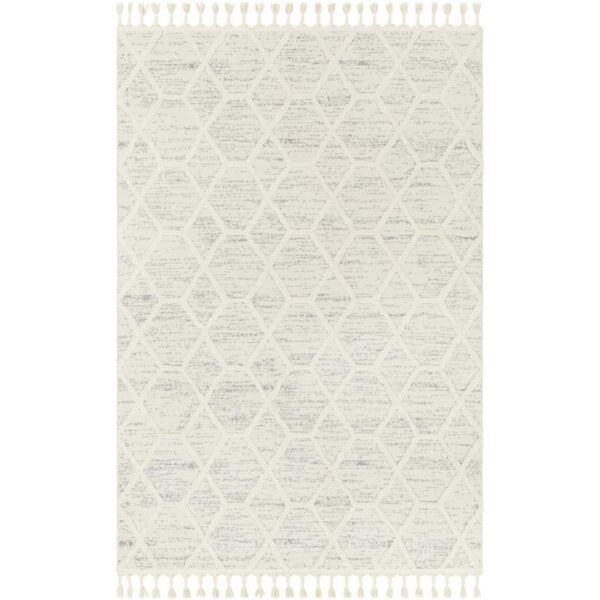 Tapis motif géométrique blanc avec franges.