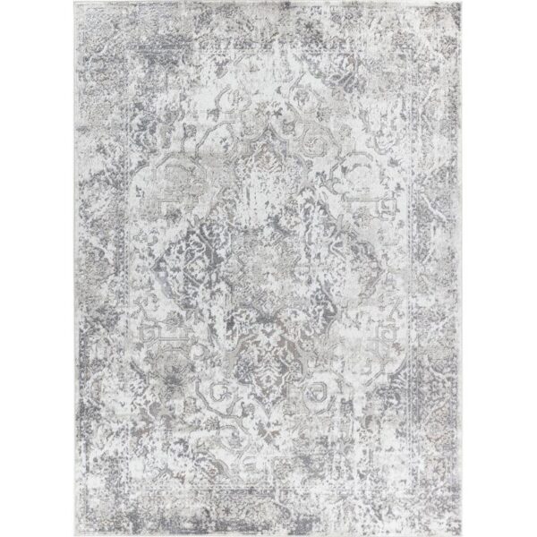 Tapis vintage gris et blanc à motif.