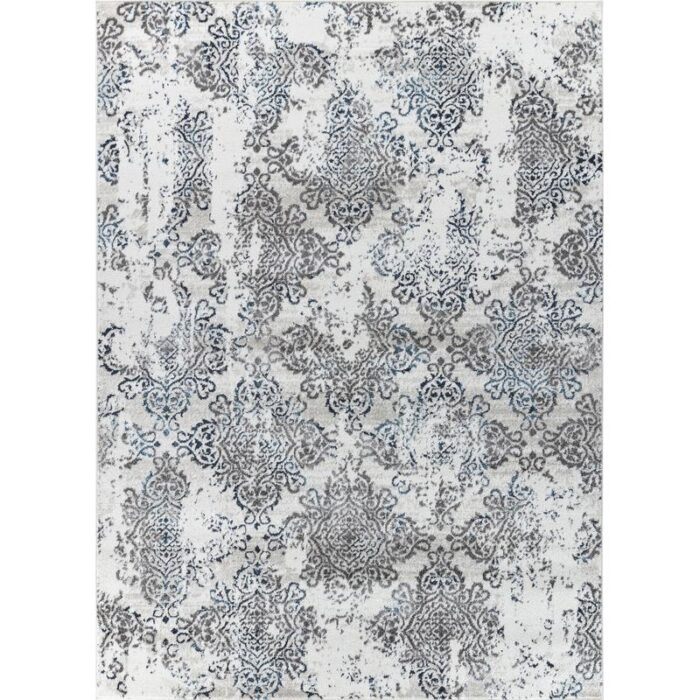 Tapis à motifs baroques bleus et gris.
