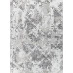 Tapis vintage motifs baroques gris et blanc.