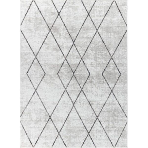 Tapis gris motifs géométriques losanges.