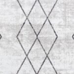 Texture tapis géométrique gris et blanc.