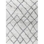 Tapis motifs géométriques gris.