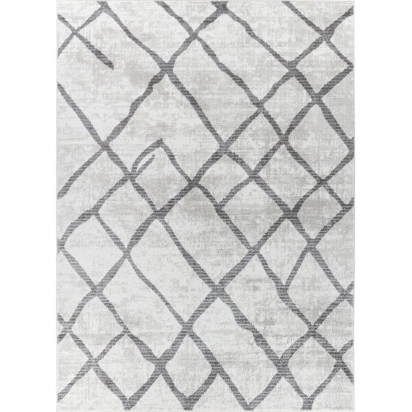 Tapis motifs géométriques gris.