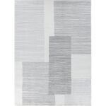 Tapis moderne noir et blanc à motifs géométriques.