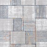 Tapis moderne géométrique gris avec lignes bleues.