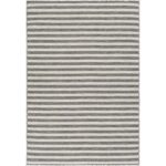 Tapis rayé gris moderne pour intérieur.