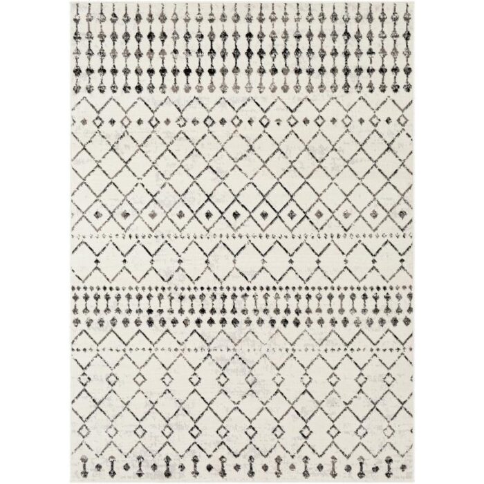 Tapis motif berbère noir et blanc.