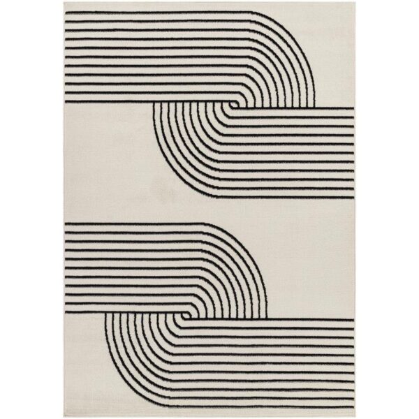 Tapis moderne à motifs géométriques noirs et blancs.