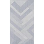 Tapis à motif chevron gris.