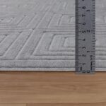 Tapis texturé et règle, mesure de l'épaisseur.